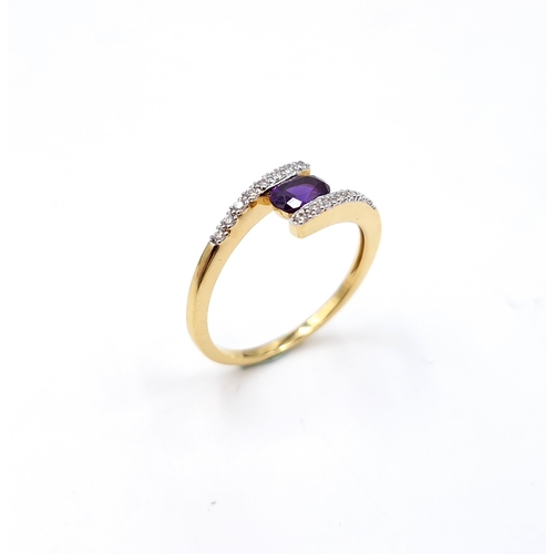 24 - A pretty amethyst stone ring with cubic zirconia accents set in a silver gilt. Size - N. Weight - 1.... 