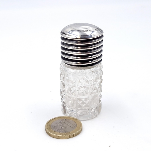 420 - A super art deco silver topped perfume bottle hallmarked Birmingham with hob nail cut glass body tog... 