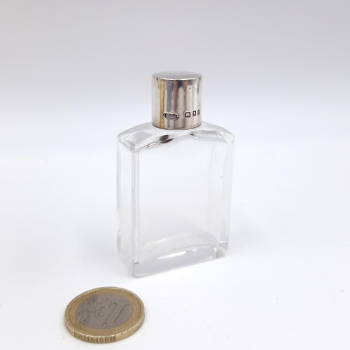 422 - A antique pretty glass perfume bottle with silver top hallmarked London 1929.