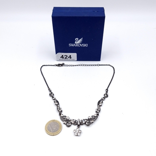 424 - An as new Swarovski gem set pendant necklace. Length of necklace - 36 cms. Weight - 21.84 grams. Com... 