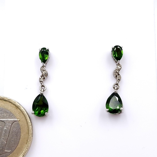 427 - A pair of vintage diopside and diamond drop stud earrings marked 925. Weight - 2.14 grams. Boxed.