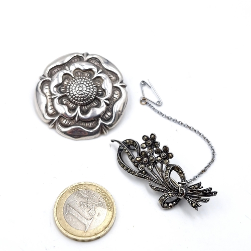 438 - Two vintage brooches. A sterling silver rose brooch: Dimensions - 4 cms diameter. Weight - 16.5 gram... 