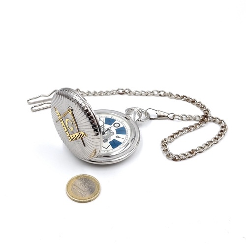 440 - A masonic quartz pocket watch with masonic dial and sweep second hand with chain. Dimensions: 5 cms ... 