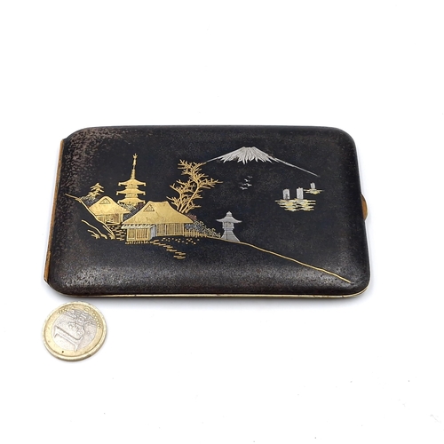 441 - A vintage enamelled Japanese cigarette case with silver and gold inlay set with Japanese mark. Dimen... 