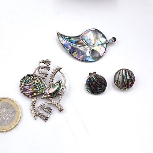 454 - A collection of sterling silver abalone shell brooches (Pins intact) & clasp earrings. Total weight ... 