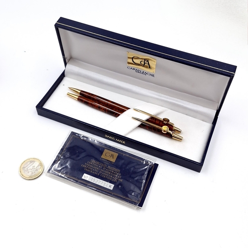 462 - A set of Caran d'Ache Geneve containing a ballpoint & propelling pencil. Comes with certificate in o... 