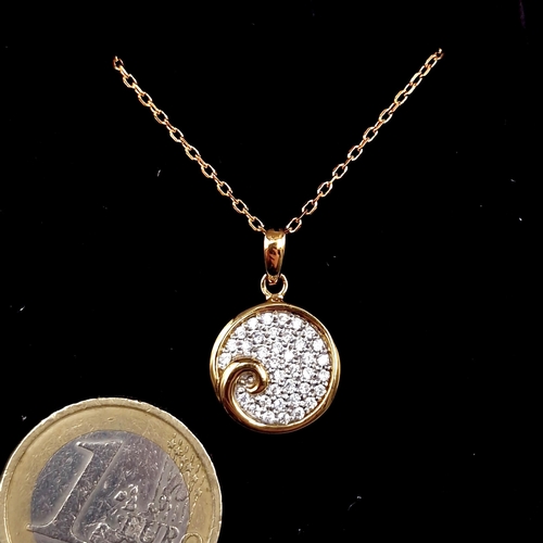 475 - A silver gilt gem set circular pendant & chain. Length of chain - 44 cms. Total weight - 3.86 grams.... 