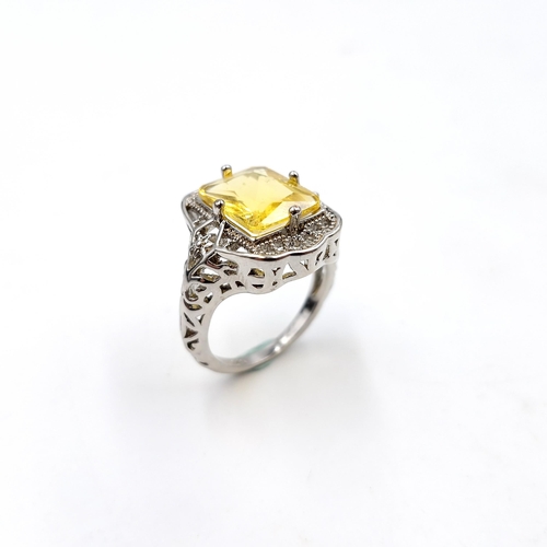 491 - A large citrine stone ring set in sterling silver with claw mount. Ring size - P. Weight - 4.98 gram... 