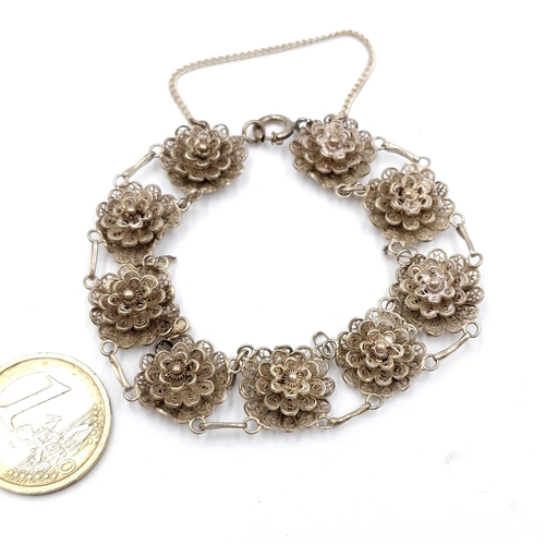 494 - A filigree Rose Bradet silver bracelet. Weight - 17.55 grams.