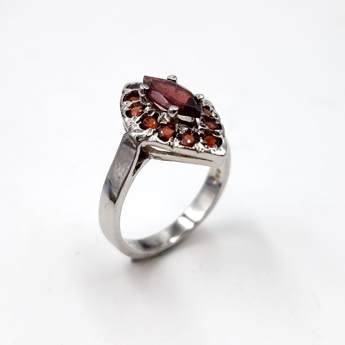 55 - A very pretty ruby gemset ring mounted in sterling silver. Ring size - S. Weight - 5.1 grams. Boxed.... 