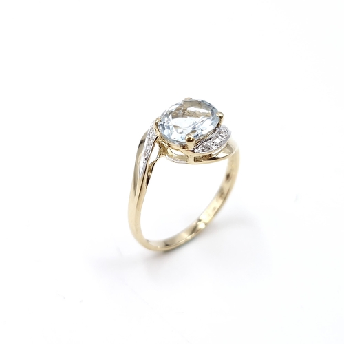 8 - Star Lot : A beautiful example of a large aquamarine gemstone ring set in nine carat gold with diamo... 