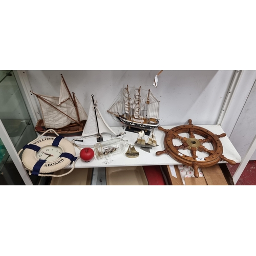 131 - A great selection of nautical themed items including a fabulous vintage ships wheel, six model ships... 