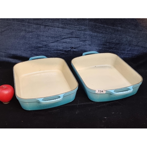 134 - Star Lot : Two fantastic heavy cast iron double handled Le Creuset casserole dishes, stamped to hand... 