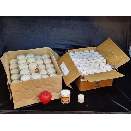 136 - Two boxes of ecclesiastical candles including a 40 Pope Francis candles and a box of 12hr votive lig... 