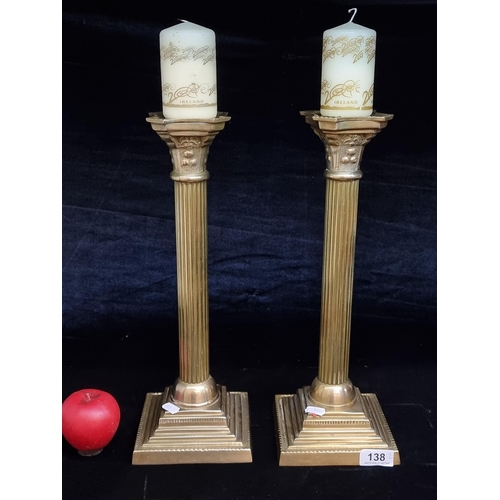 138 - A pair of vintage quality tall brass Corinthian style column candle sticks. Nice weight to these pie... 