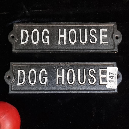 147 - A pair of cast metal wall plaques reading 'Dog House'.