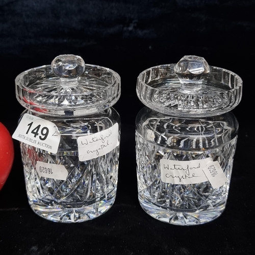 149 - A pair of Waterford Crystal lidded preserve pots. Both in good condition with acid marks to base.