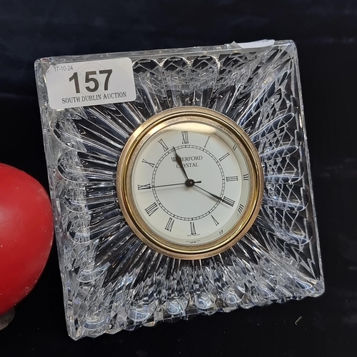 157 - A heavy quality Waterford Crystal desk clock with battery movement. In very good condition with acid... 