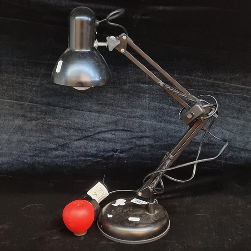 166 - An adjustable Anglepoise desk lamp with three pin plug.