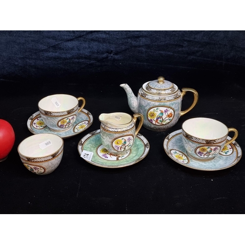 174 - A eight pieces of Noritake Japan including tea pot, creamer, cups, saucers and sugar bowl. These fea... 