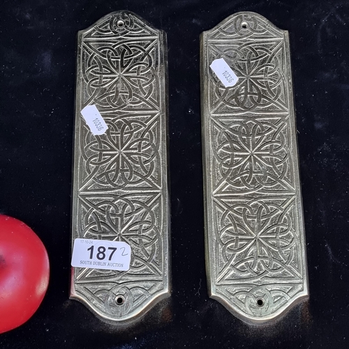 187 - A pair of cast brass Liffey artifacts door push plates featuring featuring Celtic designs.