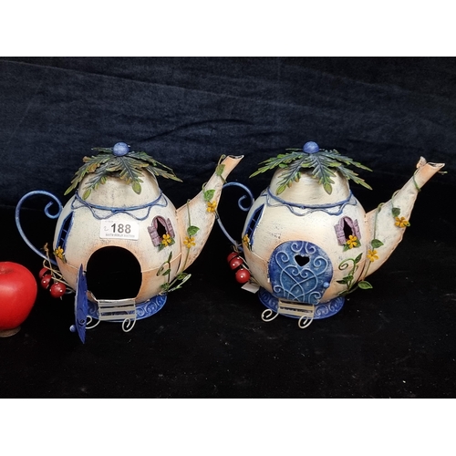 188 - A pair of whimsical fairy houses in the form teapots. Brand new for a top UK designer.