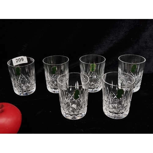 209 - A stunning set of six Waterford Crystal Whiskey tumbler glasses in the Lismore pattern, all in excel... 