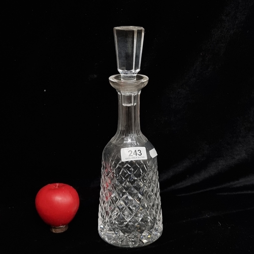 243 - A tall Waterford Crystal decanter with original stopper in the Boyne pattern. In very good condition... 