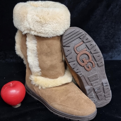 276 - A pair of UGG swede fur trim boots. Women's size UK 5 1/2.  In nice clean condition.