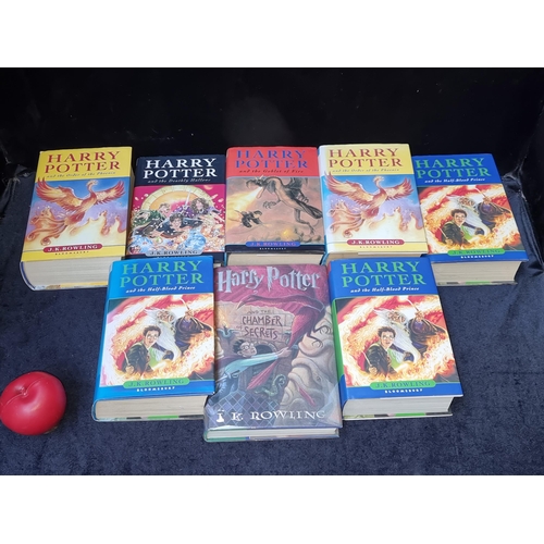 320 - Star Lot ; Eight hardback First Edition Harry Potter books including the Goblet of Fire and the Deat... 