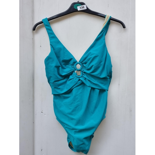 336 - A brand new with tags turquoise blue Miracle ladies swim suit. RRP €185. size UK 12.