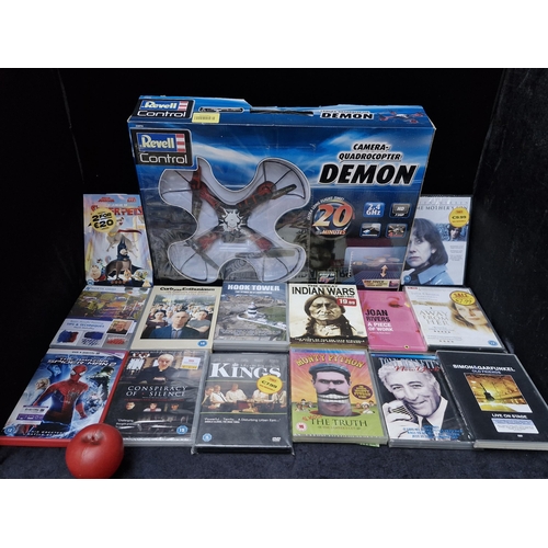 364 - A Revell Control Demon Camera quadrocopter (selling online for £39.99+), along with a bag of DVD's.