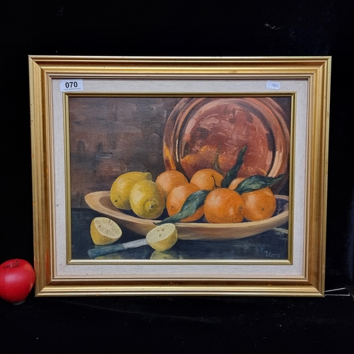 70 - A delightful original 'P M Ennis' oil on board painting titled 'Oranges and Lemons'. Features a stil... 