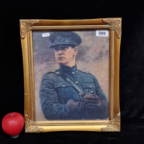 89 - A vintage print of a Michael Collins portrait in uniform. Housed in a gilt frame behind museum glass... 