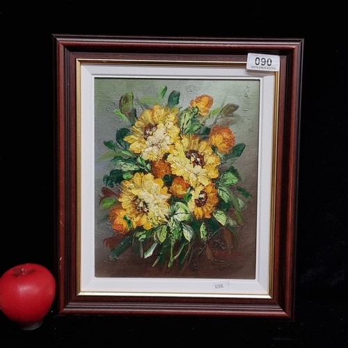 90 - A very pretty oil on board painting featuring a still life of chrysanthemum flowers. Rendered in thi... 