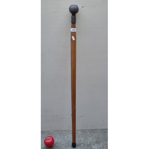 282 - A good walking stick with heavy pommel top