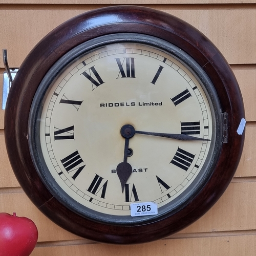 285 - Star Lot : A Riddles Limited of Belfast School clock. in Good order with single key hole.