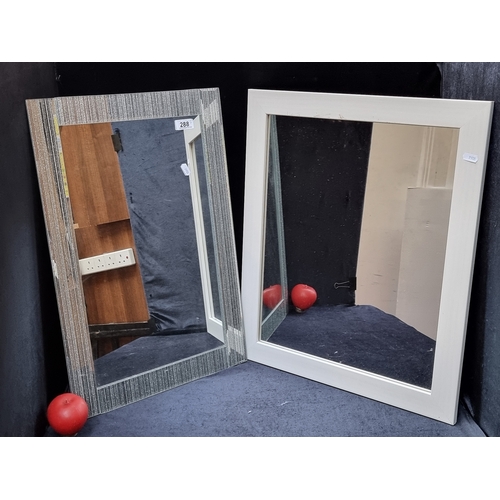 288 - Two modern mirrors including a silver framed example.