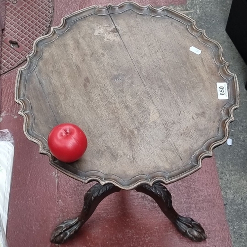 650 - Antique mahogany pie crust  wine table by Pim Bros. Ltd, Dublin, features a finely carved tripod bas... 