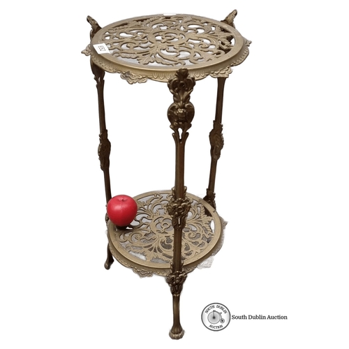 652 - Brass Victorian-style plant stand with ornate filigree detailing. Approximately 30 inches tall.