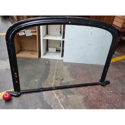 656 - Antique Victorian overmantel mirror with black frame, wooden backing. Approximately 120 cm wide x 90... 