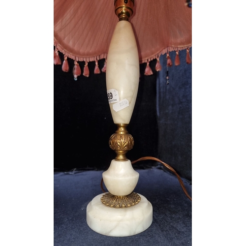 659 - Pair of vintage alabaster lamps with pleated pink fabric shades, adorned with tassels. Approximately... 