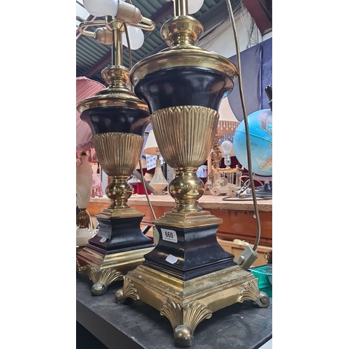 660 - Star Lot : A beautiful Pair of brass and black metal table lamps, urn-style design. Approximately 24... 