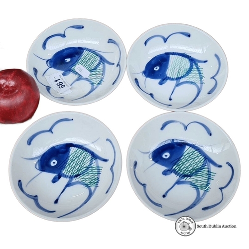 661 - Set of four hand-painted Chinese porcelain dishes, featuring blue fish motifs. Marked on the base wi... 