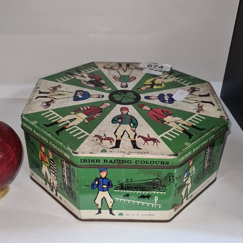 674 - Vintage Irish Racing Colours tin, featuring jockey illustrations. Octagonal shape, approximate size:... 