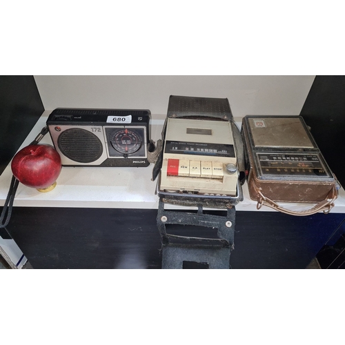 680 - Vintage electronics lot featuring a Philips radio, solid-state radio recorder, and an additional rad... 