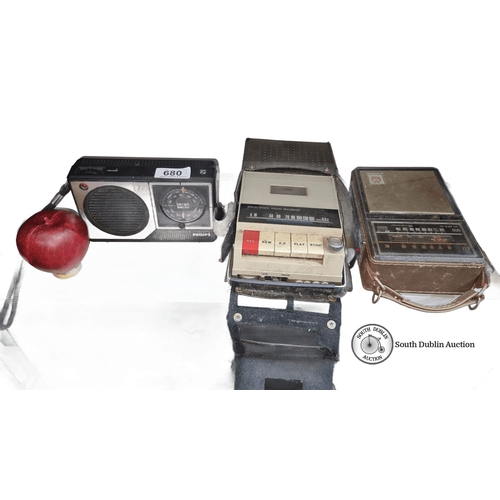 680 - Vintage electronics lot featuring a Philips radio, solid-state radio recorder, and an additional rad... 