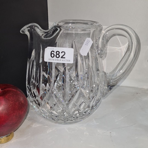 682 - Waterford Crystal Whiskey jug with pinched spout, featuring intricate diamond and starburst cuts. Cl... 