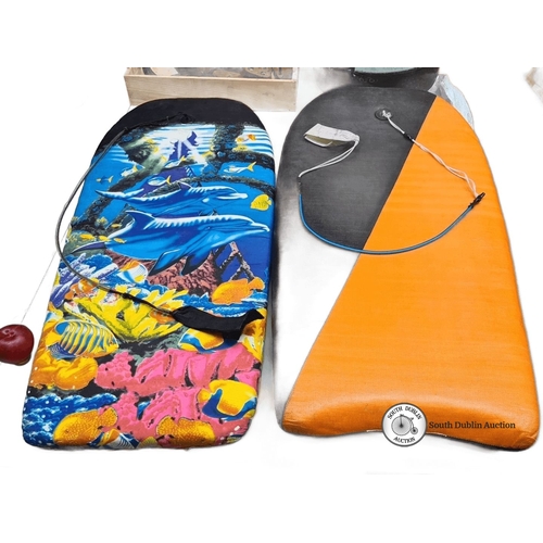 695 - Pair of bodyboards featuring vibrant ocean-themed and orange designs.