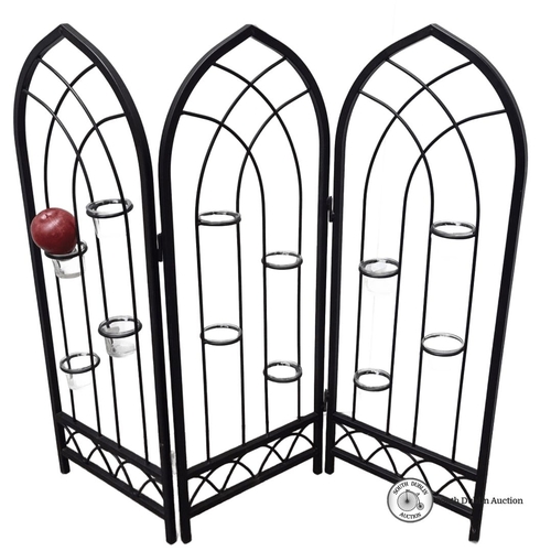 699 - Black wrought iron folding candle holder with Gothic arches design, featuring eight glass candle cup... 